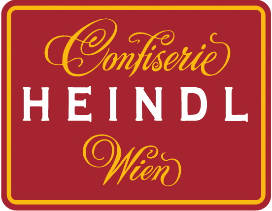 meinkarrierestart.at Ein rotes, rechteckiges Logo mit dem Schriftzug "Confiserie Heindl Wien" in gelber und weißer Schrift und Blockbuchstaben.