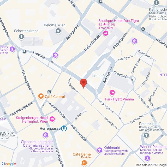 meinkarrierestart.at Eine digitale Karte zeigt die Innenstadt von Wien, Österreich, mit eingezeichneten Hotels, Cafés und Sehenswürdigkeiten in der Nähe sowie einer roten Stecknadel, die einen nicht näher bezeichneten Punkt markiert.