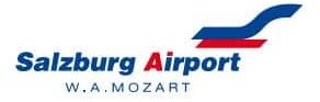meinkarrierestart.at Logo für den Salzburger Flughafen W.A. Mozart, mit stilisierten blauen und roten Linien über dem Namen des Flughafens in blauer und roter Schrift.